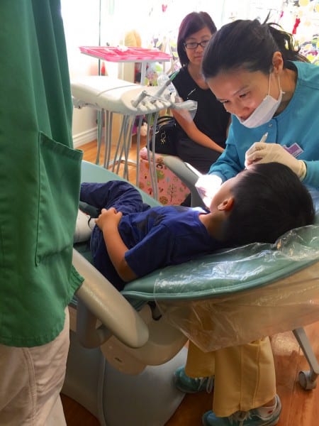 Dr. Ashley checking Aiden's teeth..